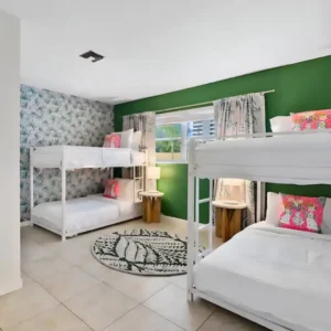 Quad Room Bottom Bunk + Semiprivate Bathroom